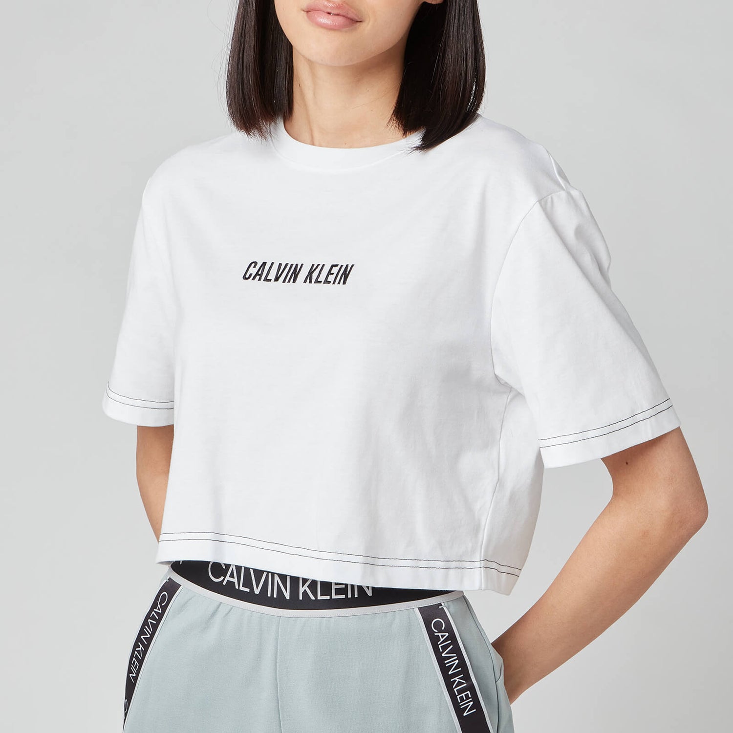Calvin Klein Performance Women's Open Back Cropped Short Sleeve T-Shirt - Bright White