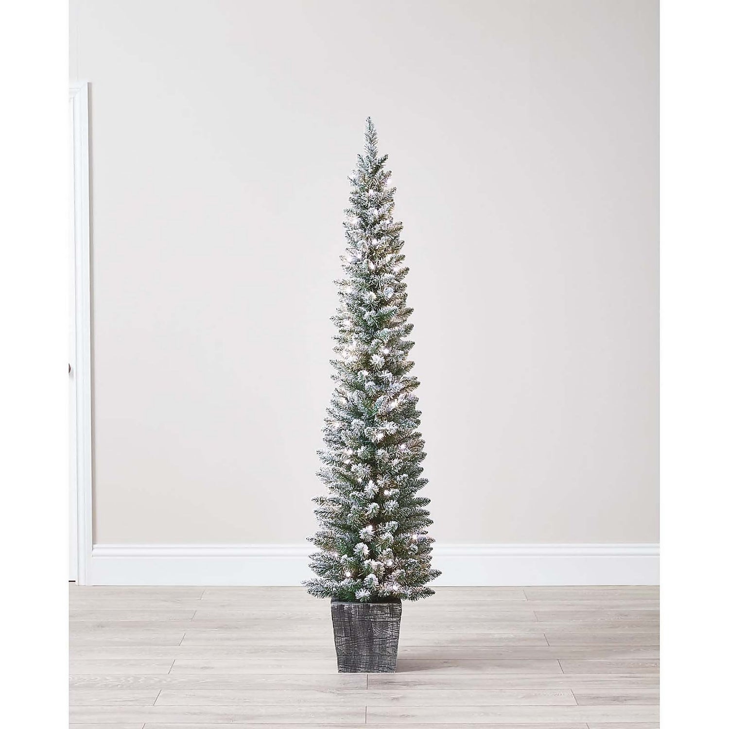 6Ft Slim Flocked Pre-Lit Potted Christmas Tree | Homebase