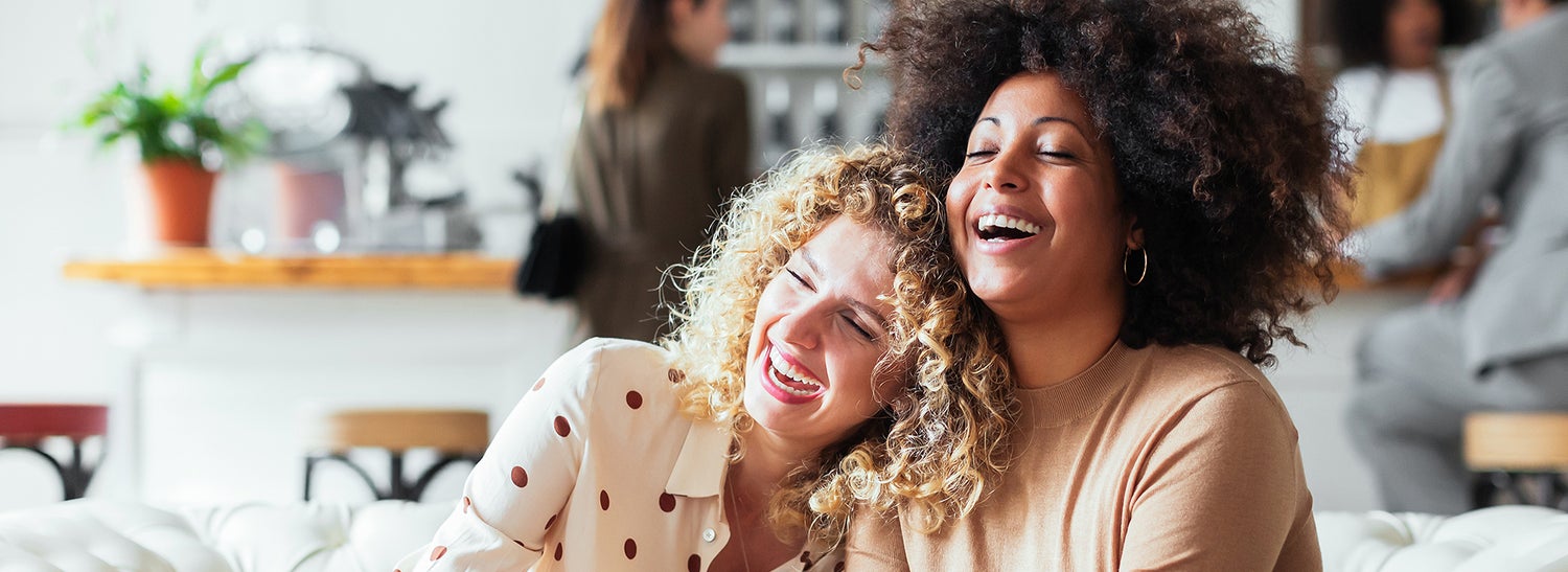 Two Womans smiling