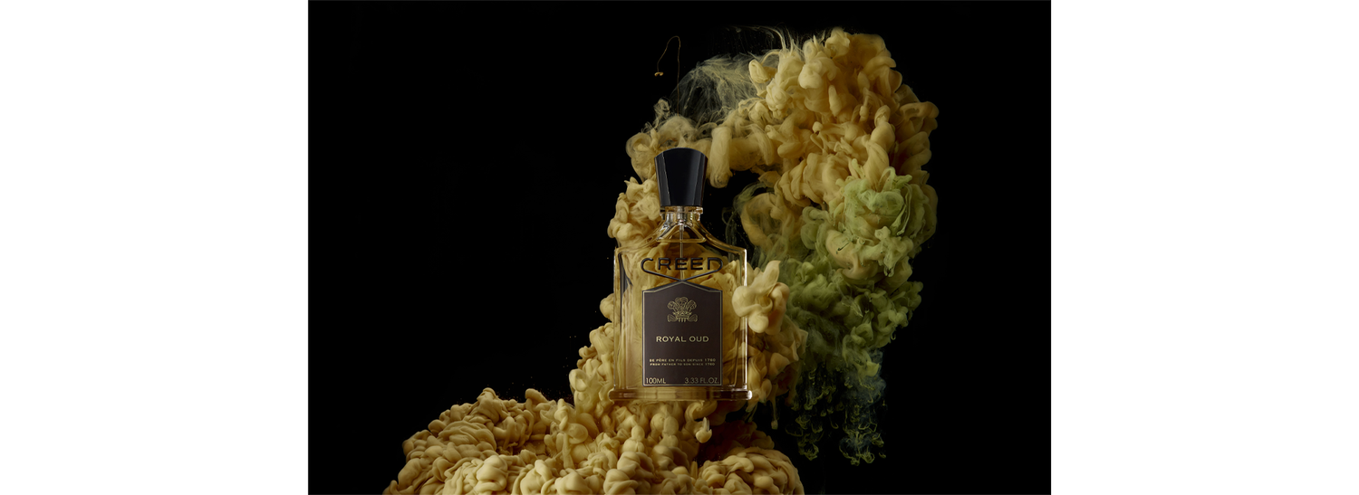 Royal Oud surrounded by coloured smoke
