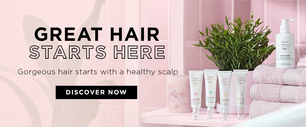 Great hair starts here gorgeous hair starts with a health scalp Grow Gorgeous scalp care range on pink background