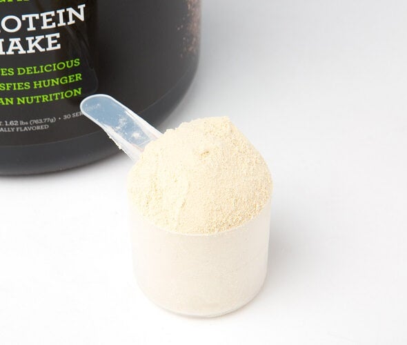 A scoop of IdealRaw protein powder