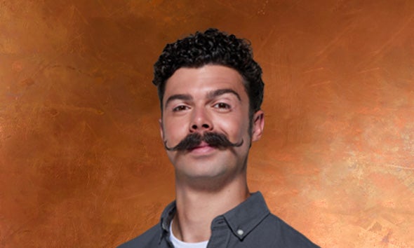 Man showcasing Movember Moustache