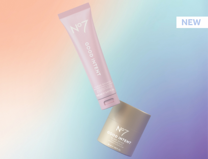 Ombre pastel coloured background with peach, blue and purple shades. 'New' text in light blue with white box in the right top corner. 2 GOOD INTENT products shot falling. One purple tube and one toffee coloured pot.