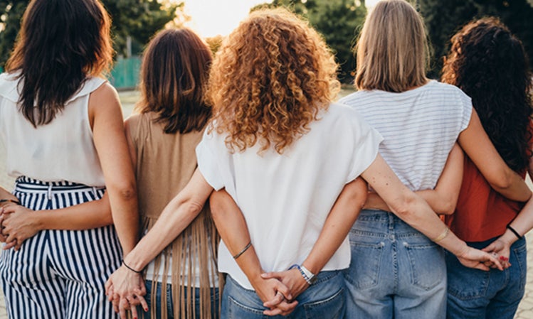 women holding hands