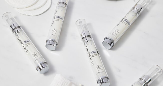 Four tubes of No7 Laboratories Line Corrector on a white counter