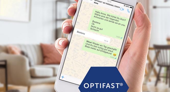 Handy mit WhatsApp-Nachrichten von OPTIFAST® My Personal Coach