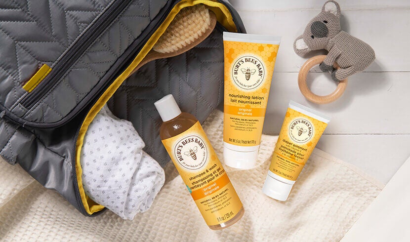 A bottle of Burt's Bees Baby Bee Shampoo & Wash, Nourishing Lotion and Diaper Ointment