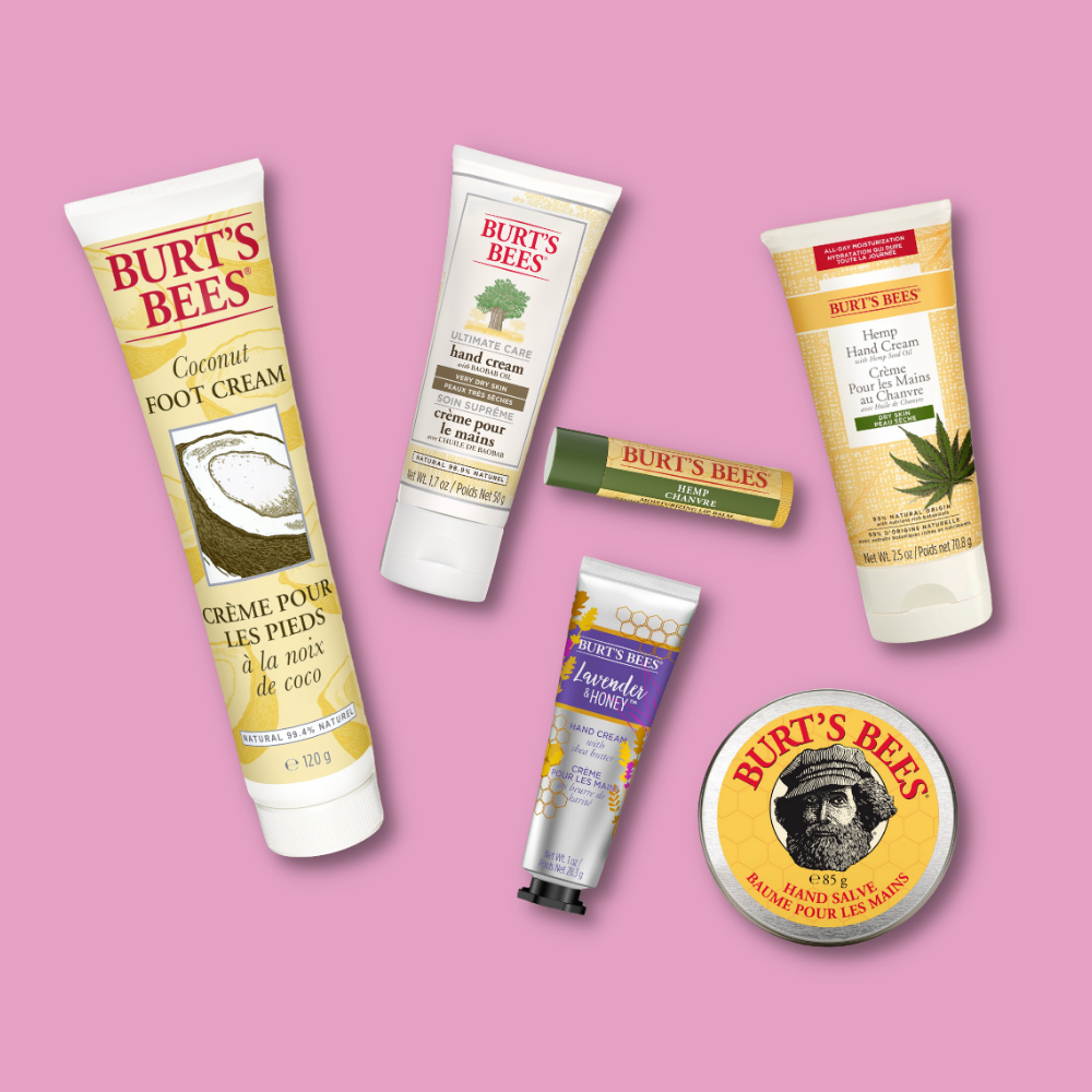 Burt's Bees Skin and Lip Care products on a green background, including Coconut Foot Cream, Hemp Hand Cream and Match & Honey Lip Balm
