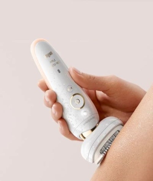 close up of woman's leg as she uses the silk-epil 9 flex epilator to remove hair from her leg