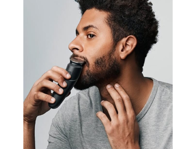 Beard styling / trimming - Braun - man using Braun 10-in-1 All-in-one Trimmer 7 MGK7220 on his beard's mustache