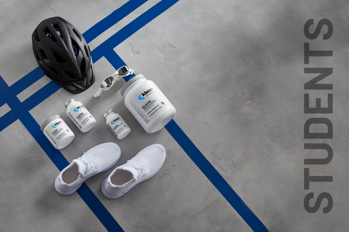 Klean recovery supplement, Klean hydration, Klean Endurance range next to a cycling helmet, glasses and trainers.