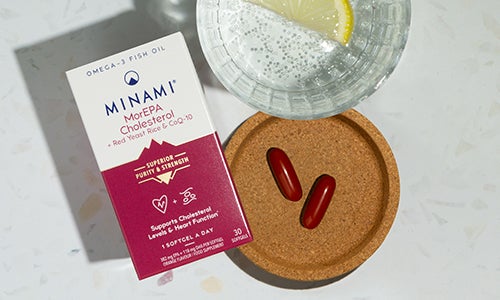 Minami omega-3 MorEPA Cholesterol tablets with glass of water