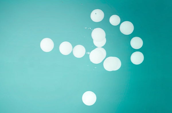 white bubbles on teal background