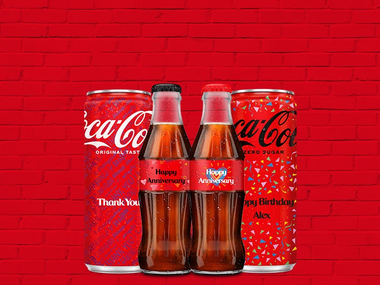 personalised glass bottle and 250ml cans set against a red background