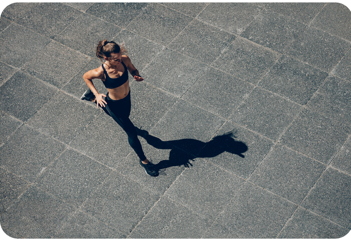 A woman running outside.
