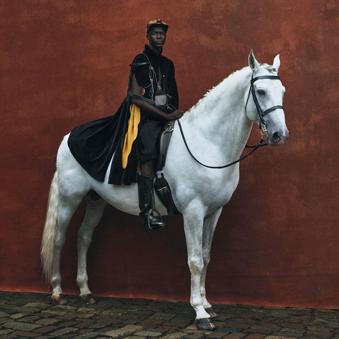 Man on white horse