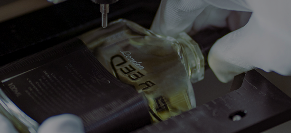 Aventus bottle being engraved with 'London'