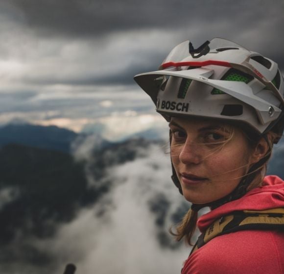 Endura team athlete atop a mountain