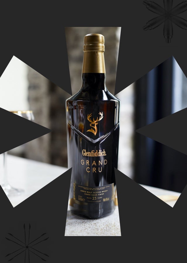 A bottle of Glenfiddich Grand Cru inside the shape of the Clink* logo