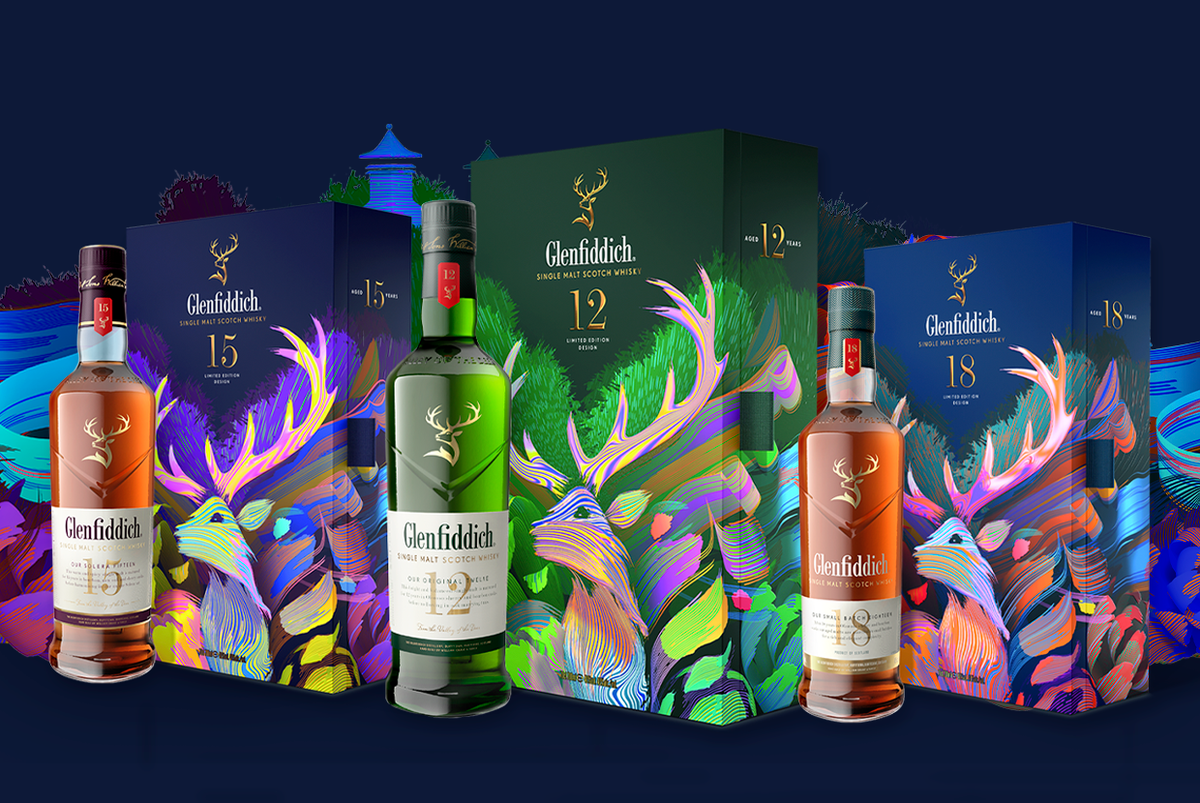 Bottle of Glenfiddich with 3 different packaging boxes