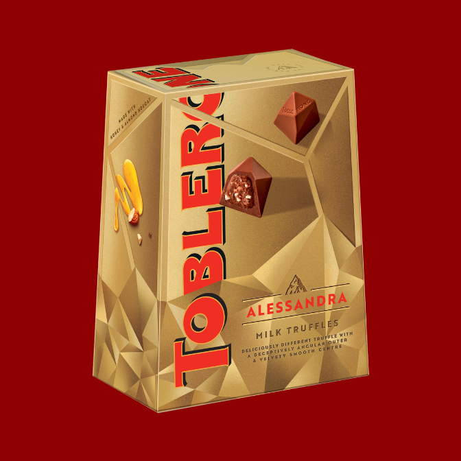 Personalised Toblerone Truffles Box placed in front of a red background.
