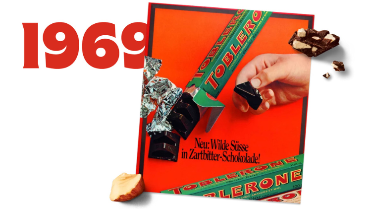 A picture of a Toblerone with the year 1969 next to it in red.