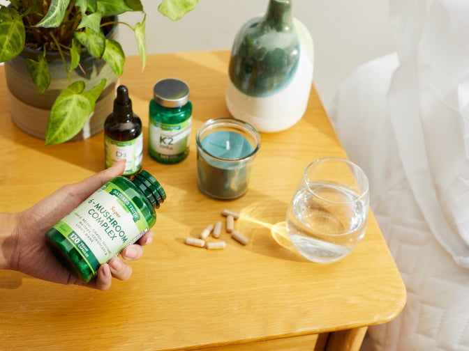 table full of natures truth products, namely mushroom complex