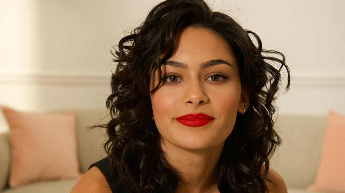 Woman showing off her curls that were created using a revlon curling tong