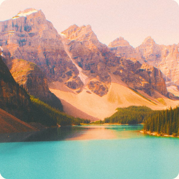 photo of mountains and a lake
