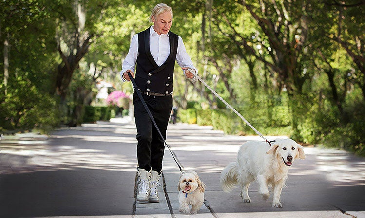 Image of Dr Fredric Brandt walking his dogs