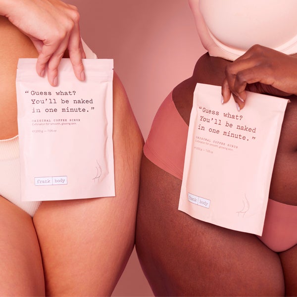 Two women in underwear holding a frank body scrub product