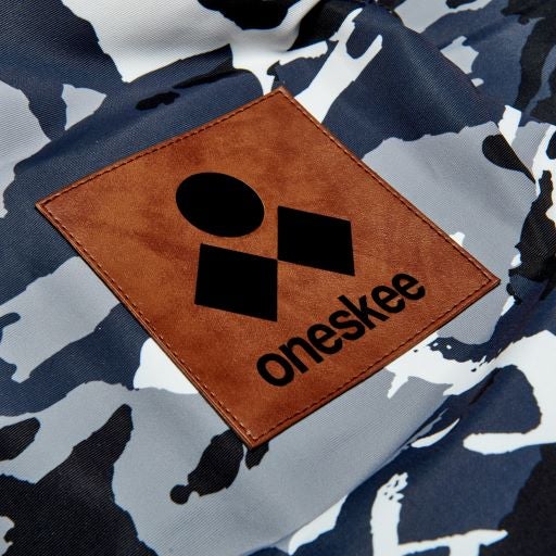 Oneskee logo on the snowsuit