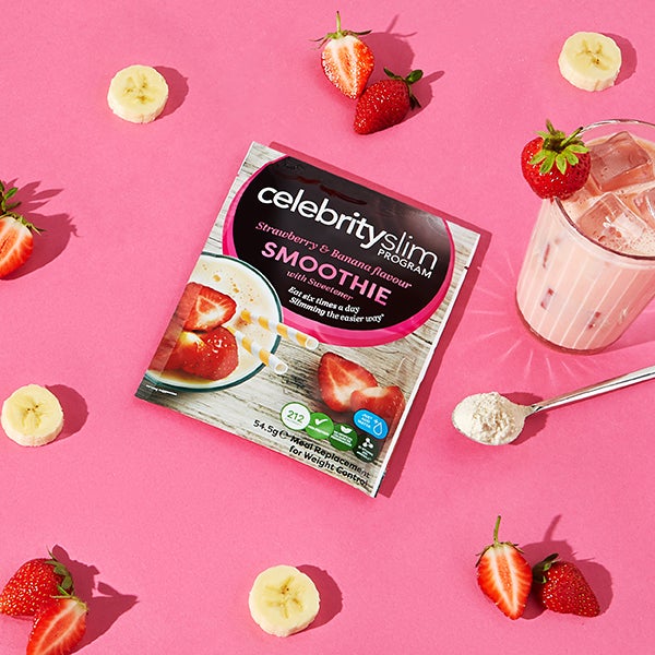 Celebrity Slim Strawberry and Banana Flavour Shake surrounded by strawberries and bananas