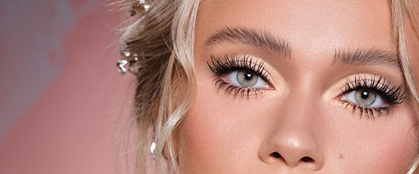Close-up shot of a female model's eyes with full eye makeup