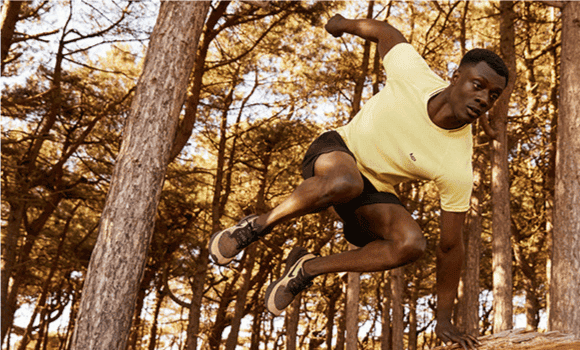 man running in forest