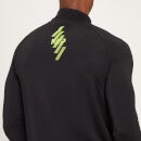 Camiseta de entrenamiento con cremallera de 1/4 y detalle gráfico Linear Mark para hombre de MP - Negro - XS