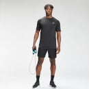 Pantalón corto de entrenamiento con estampado de marca repetido para hombre de MP - Negro
