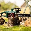 Electric top chainsaw homebase