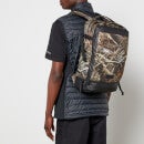 Eastpak Men's Realtree Tecum M Backpack - Black/Camo Print