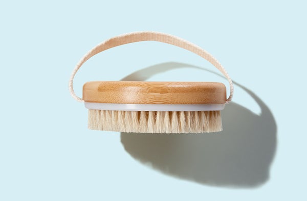 Mio Body Brush displayed in packaging against light blue backdrop. Links to individual product page.