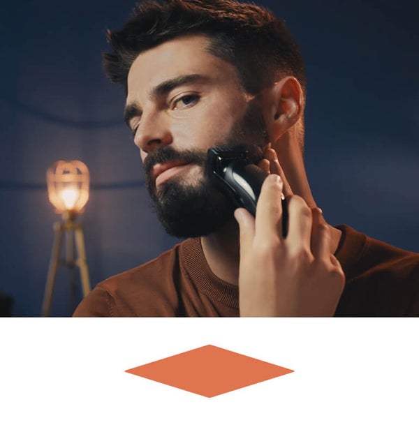 Man shaving beard with King C. Gillette Beard Trimmer
