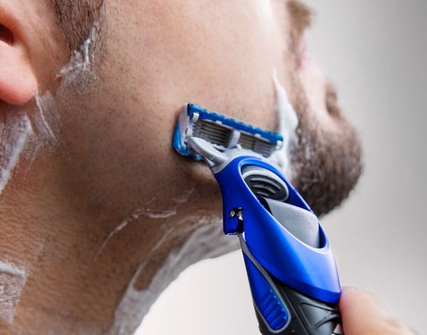 Man shaving with Gillette Styler.