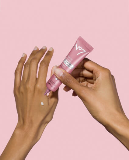 Hand applying No7 skincare cream to their other hand