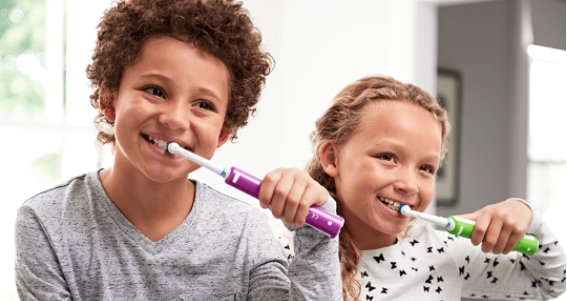 image of children brushing teeth
