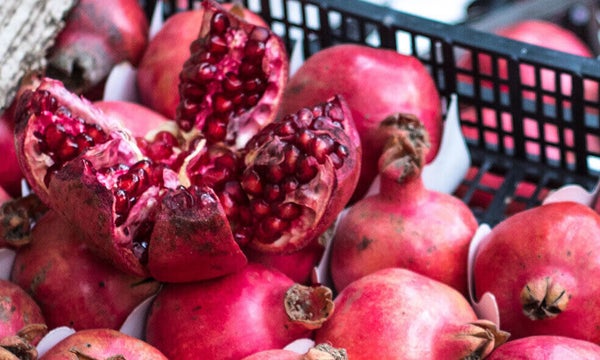 A pomegranate fruit cracked open