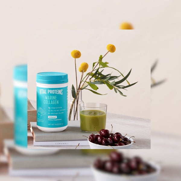 Vital Proteins Marine Collagen with a smoothie and cherries promoting our collagen category