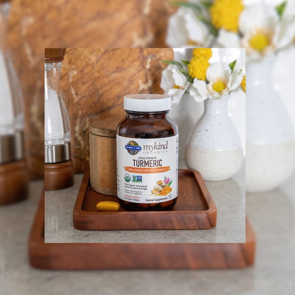 Garden of Life Turmeric supplements on a countertop