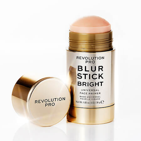 Pro blur stick stood up with the lid off next to it.