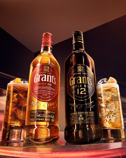 Gifts under £100. Glenfiddich bottle with dark background.